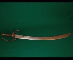 Ранняя венгерская сабля. 1580 год. Клинок с гурдой и ярко выраженной елманью. На гарде имеется защитный перстень.